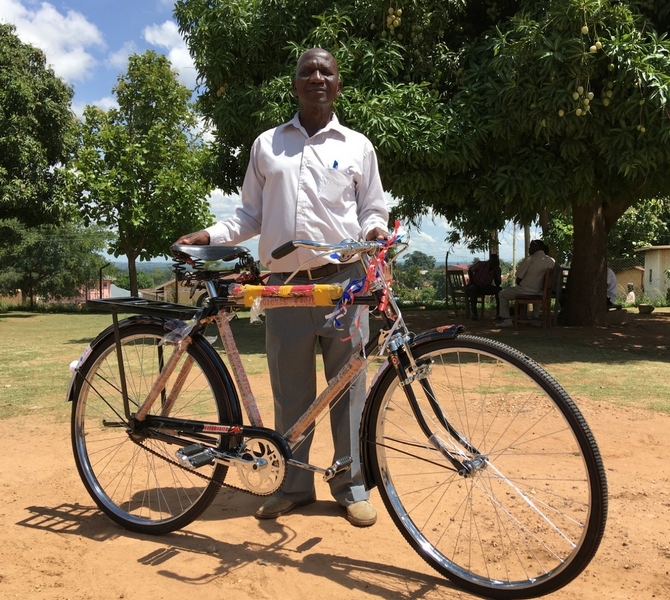 Arua, Uganda. Nyai Sami one of one of the HUMC chairperson from Vurra sub-county with his new bicycle